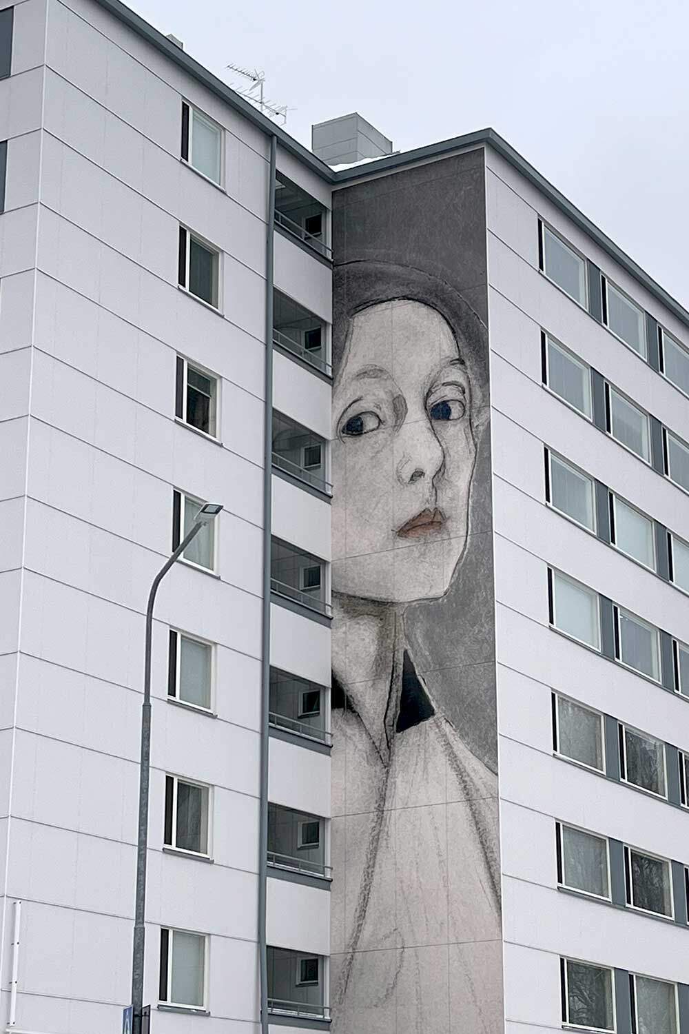 Steni Vision Custom Panels. Image of the artist who once lived in the building